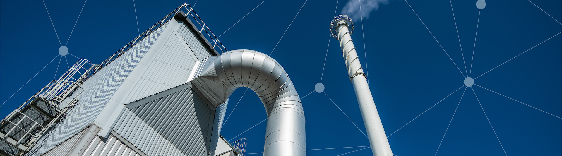 An industrial facility with a large pipe bending downwards, a metal structure, and a chimney emitting smoke against a clear blue sky with network nodes overlay.